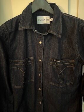 Calvin Klein snap button denim shirt. Size L.